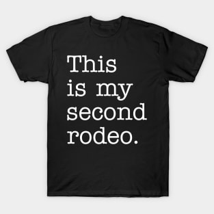 "This is my second rodeo." in plain white letters - cos you're not the noob, but barely T-Shirt